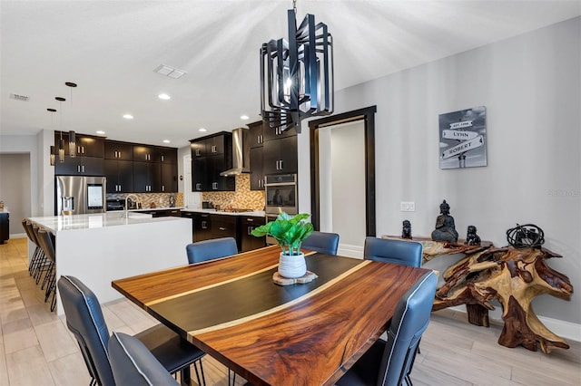 dining space with sink