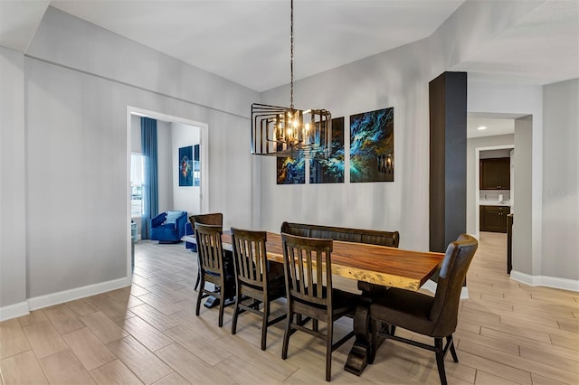 dining space featuring a chandelier