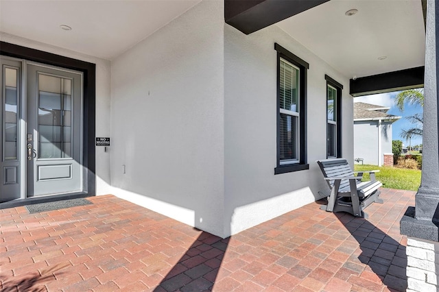 property entrance with a porch