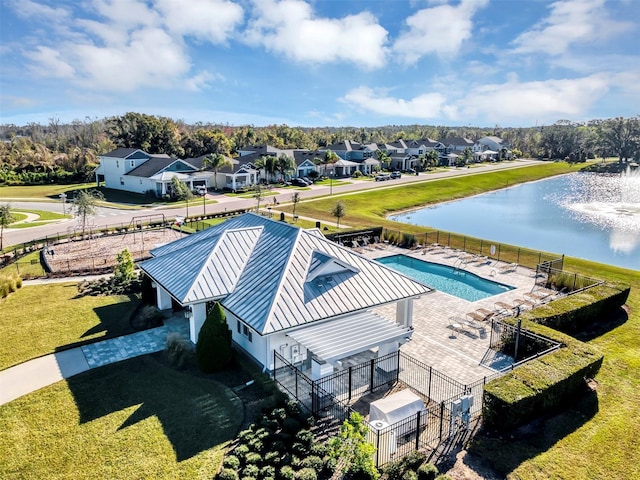 birds eye view of property featuring a water view