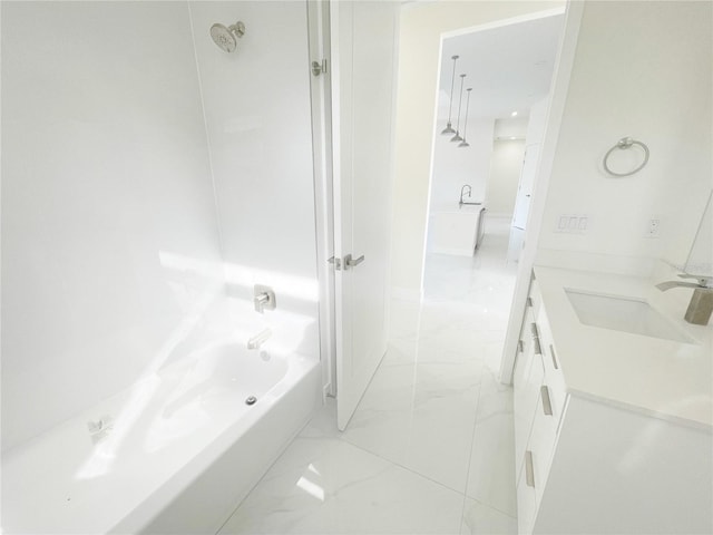 bathroom featuring vanity and marble finish floor