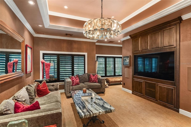 carpeted living room with a raised ceiling, crown molding, and a notable chandelier