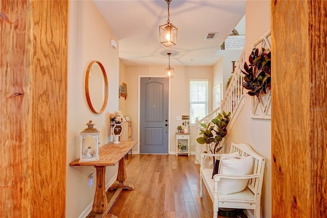 entryway with light hardwood / wood-style floors