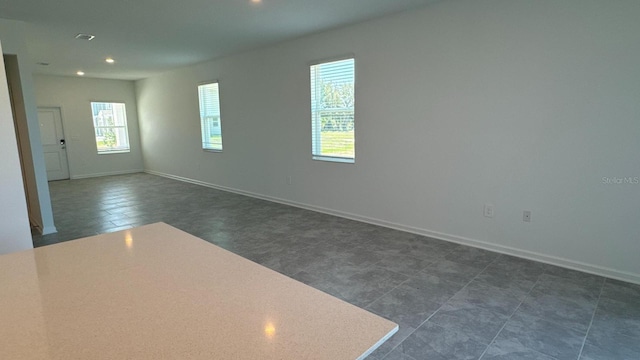 view of tiled spare room