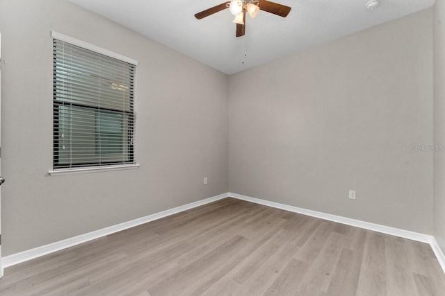 unfurnished room with light hardwood / wood-style floors and ceiling fan