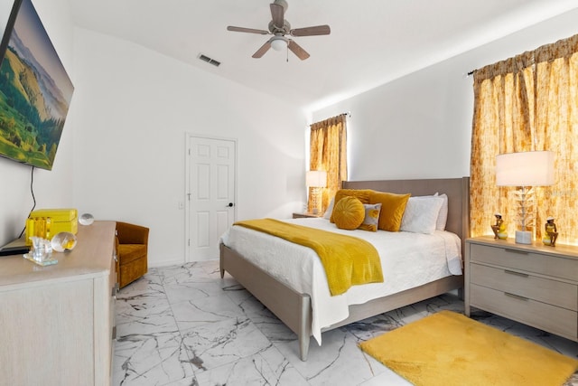 bedroom with ceiling fan and vaulted ceiling