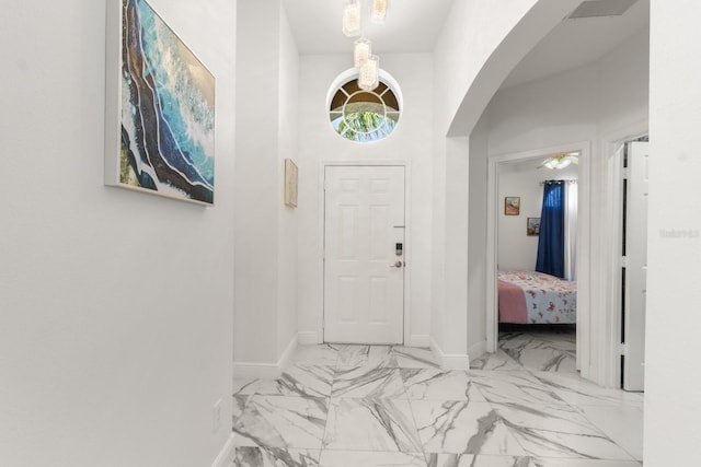 foyer with a high ceiling