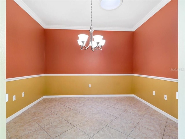 tiled empty room with crown molding and a notable chandelier