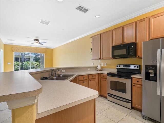 kitchen featuring kitchen peninsula, appliances with stainless steel finishes, ornamental molding, and sink