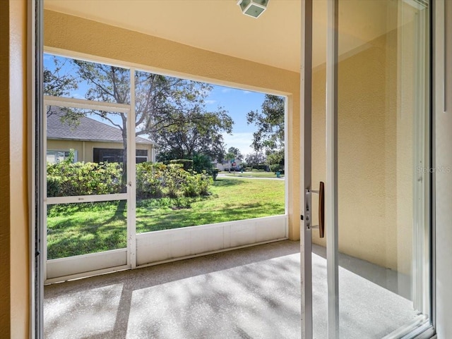 unfurnished sunroom featuring plenty of natural light