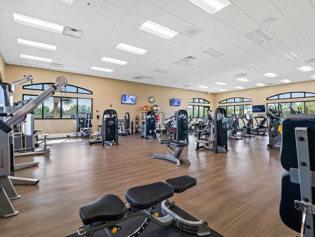 workout area with a paneled ceiling