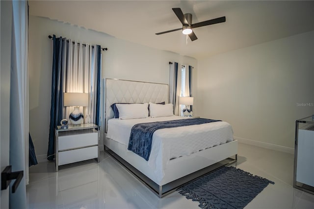 bedroom featuring ceiling fan and light tile patterned flooring