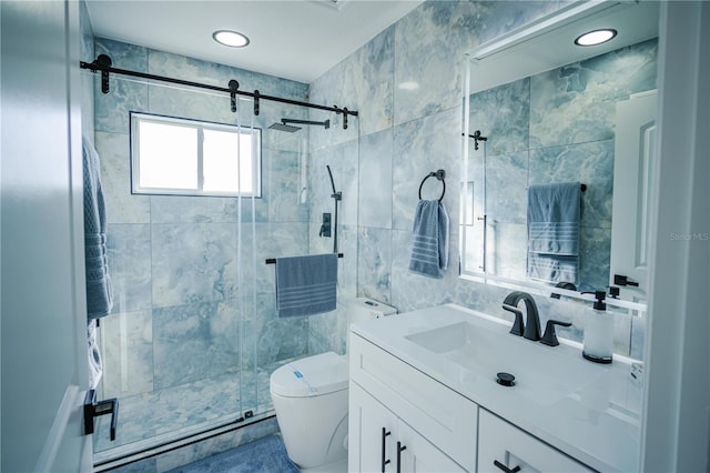 bathroom with walk in shower, vanity, tile walls, and toilet