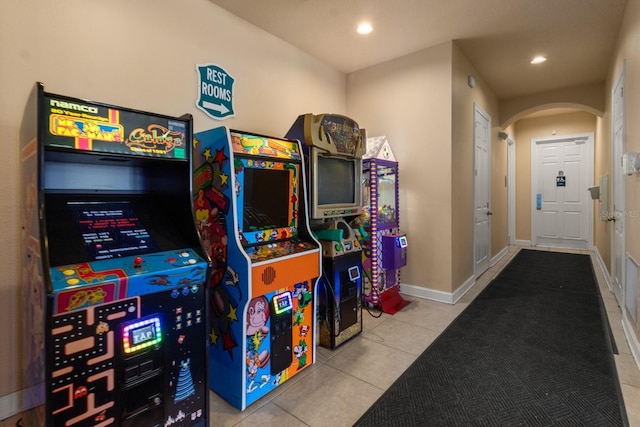 rec room featuring light tile patterned floors