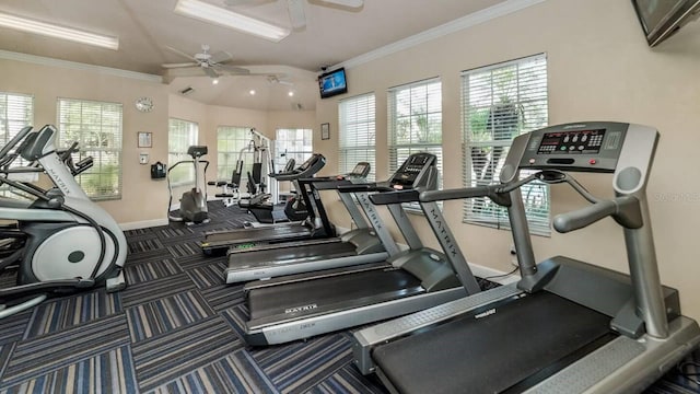 gym featuring ceiling fan, lofted ceiling, and ornamental molding