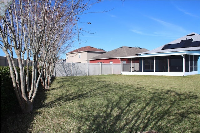 view of yard featuring a sunroom