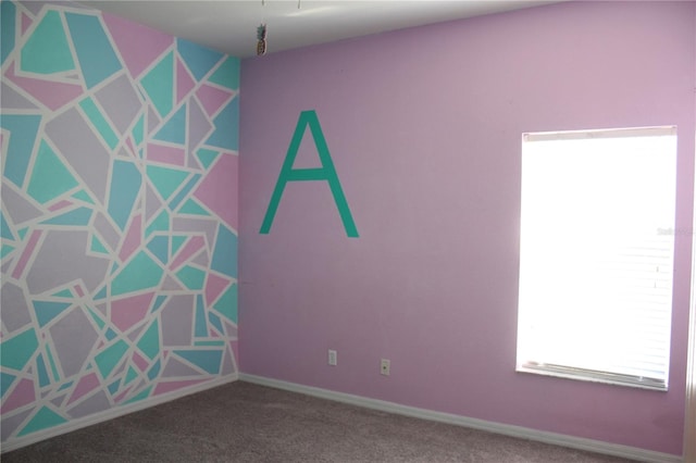 view of carpeted spare room