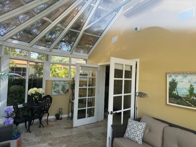 sunroom with french doors and vaulted ceiling