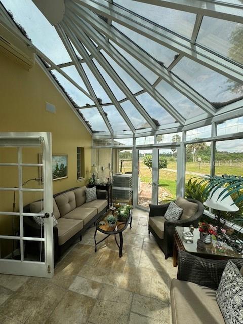 sunroom with vaulted ceiling