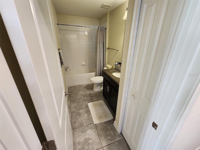 full bathroom with tile patterned flooring, vanity, toilet, and shower / bath combo