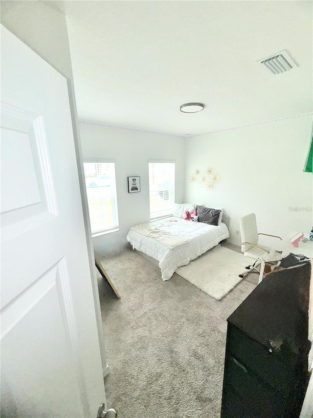 bedroom featuring carpet floors