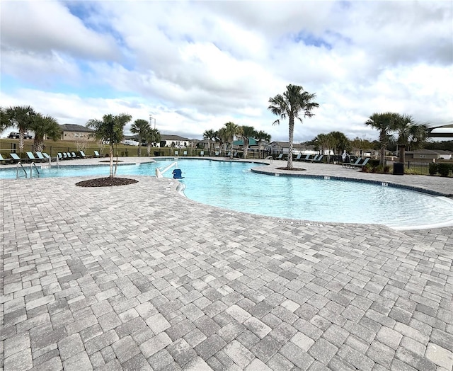 view of pool featuring a patio