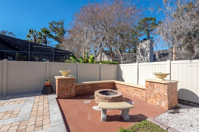 view of patio / terrace with a fire pit