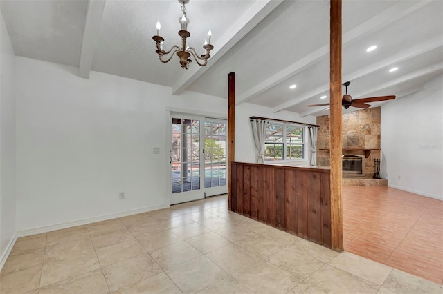 interior space with ceiling fan with notable chandelier, a stone fireplace, light tile patterned floors, a textured ceiling, and beam ceiling