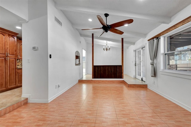 foyer entrance with lofted ceiling with beams, light tile patterned floors, and ceiling fan with notable chandelier