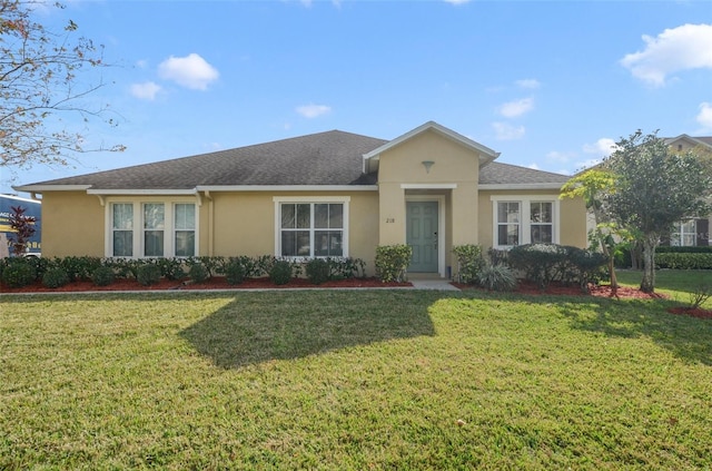 single story home with a front yard