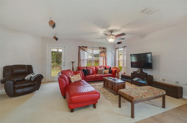 living room featuring ceiling fan