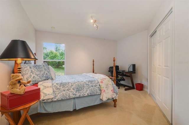 carpeted bedroom featuring a closet