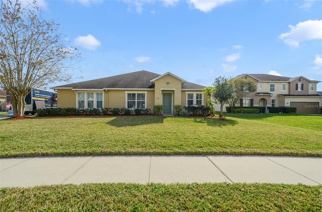 ranch-style house with a front lawn