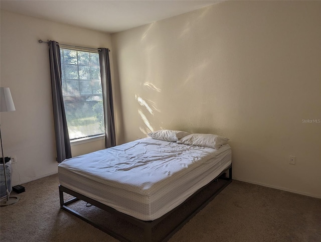 1341 Arbor Vista Loop Unit 113, Lake Mary, FL 32746 - bedroom with carpet floors and baseboards