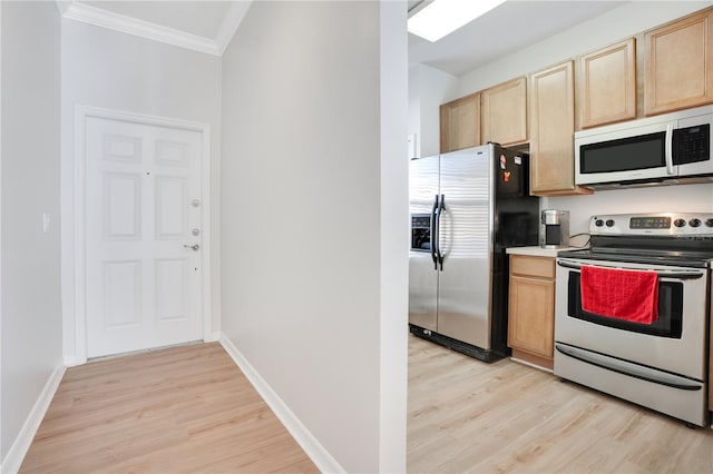 kitchen with light hardwood / wood-style floors, ornamental molding, light brown cabinets, and appliances with stainless steel finishes