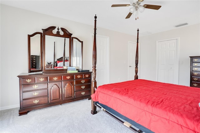 bedroom featuring ceiling fan and light colored carpet