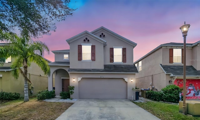 view of front of property with a garage