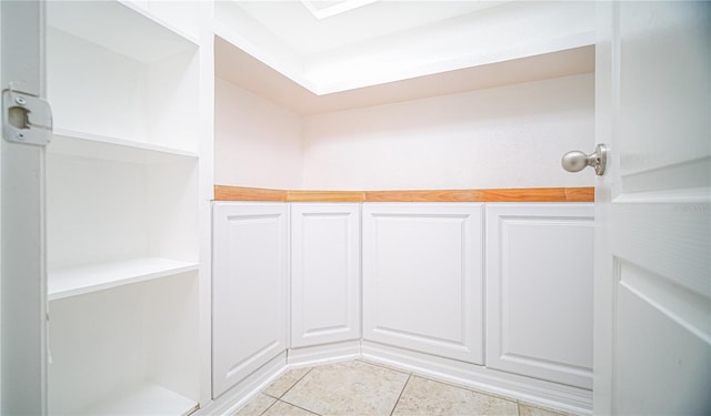 bathroom featuring tile patterned flooring