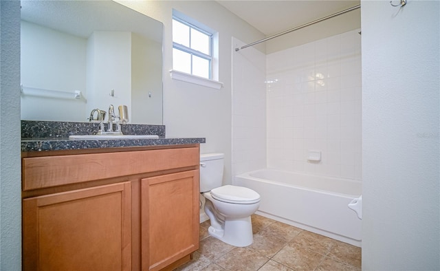 full bathroom with shower / tub combination, vanity, and toilet