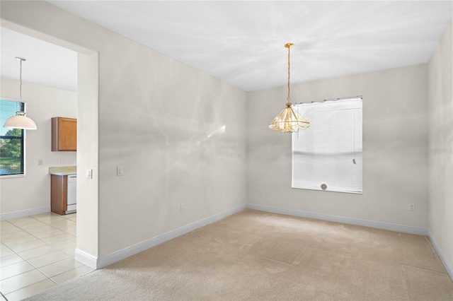 empty room featuring light tile patterned floors