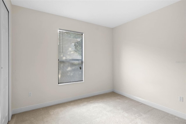 empty room with carpet floors