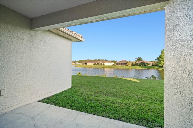 view of yard with a water view