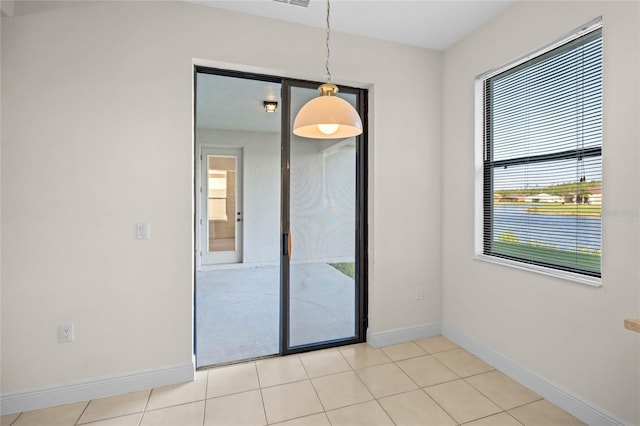 view of tiled spare room