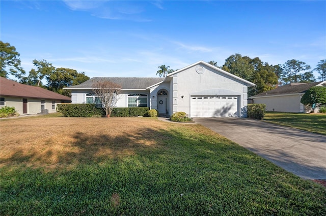 ranch-style house with a front yard and a garage