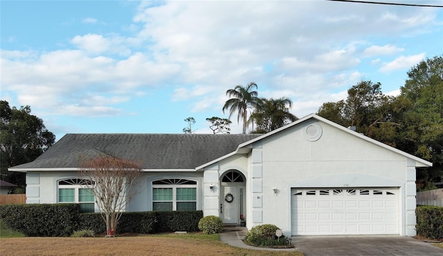 single story home featuring a garage