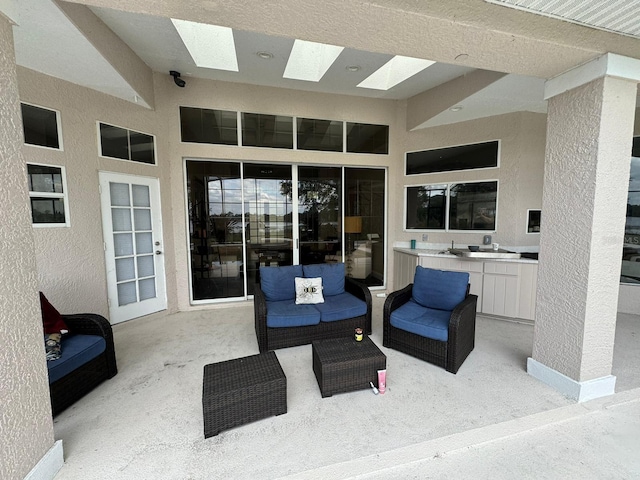 view of patio / terrace featuring outdoor lounge area and area for grilling