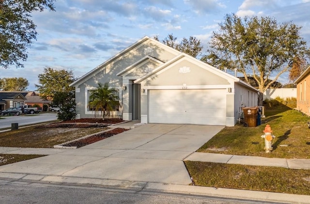 view of front of property with a garage