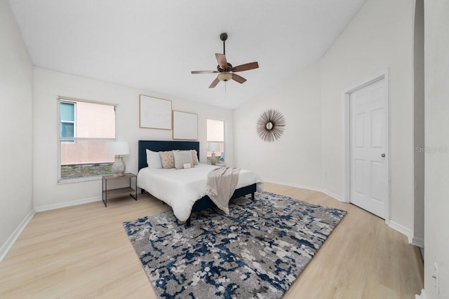 bedroom with ceiling fan and wood-type flooring