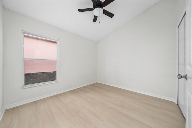 spare room featuring ceiling fan and light wood-type flooring