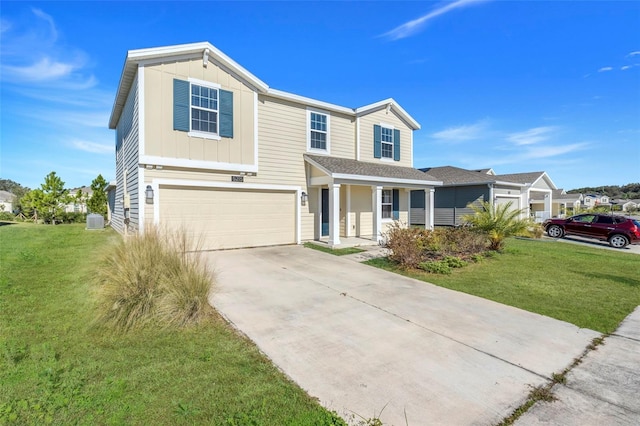 view of front of property featuring a garage and a front lawn